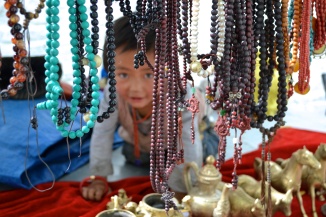 A shop keeper's baby in Tibet