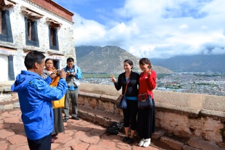Posing for a photo at the Potala Palace in Lhasa, Tibet